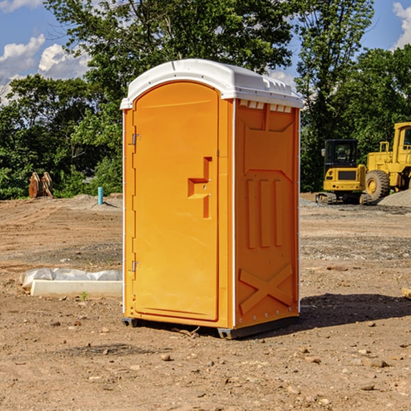 how often are the portable restrooms cleaned and serviced during a rental period in Wisner NE